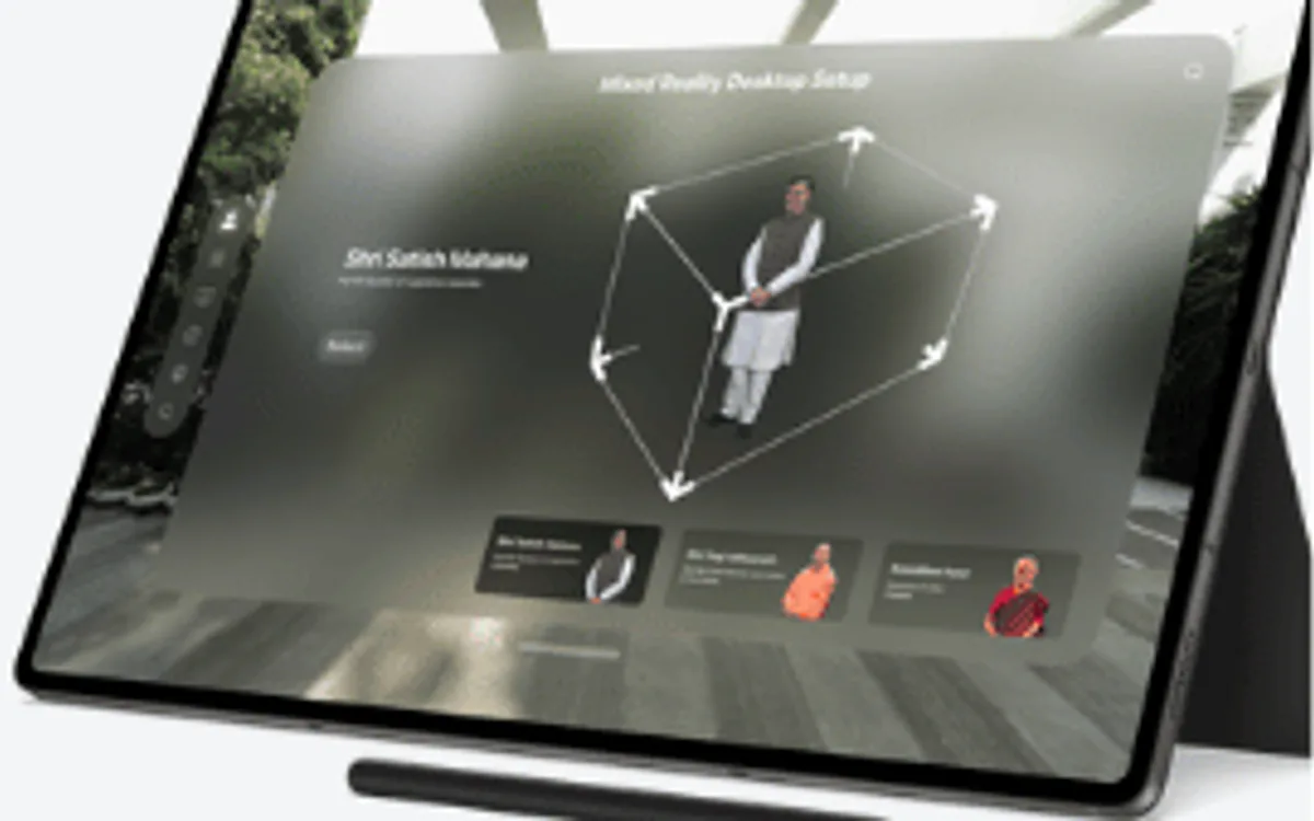 The mixed-reality desktop application running on a tablet: a subject tracked inside a three-dimensional wireframe bounding box, with selectable subject thumbnails below
